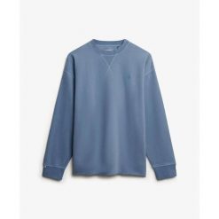 Bluza damska Superdry Studios. Niebieskie bluzy Superdry, bez wzorów, bez kaptura. Za 284.00 zł.