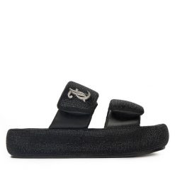 Klapki Juicy Couture. Czarne klapki Juicy Couture, bez wzorów, bez obcasa. Za 249.99 zł.