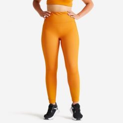 Legginsy fitness damskie Domyos. Brązowe legginsy DOMYOS, l, bez wzorów, z materiału, z podwyższonym stanem, długie. Za 69.99 zł.
