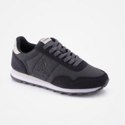 Buty sportowe damskie Astra W Knit charcoal. Szare obuwie sportowe Le Coq Sportif, bez zapięcia, trekkingowe. W wyprzedaży za 309.25 zł.