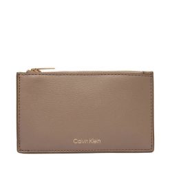Portfel Calvin Klein. Brązowe portfele Calvin Klein, bez wzorów. Za 209.99 zł.
