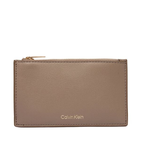 Portfel Calvin Klein. Brązowe portfele Calvin Klein, bez wzorów. Za 189.99 zł.