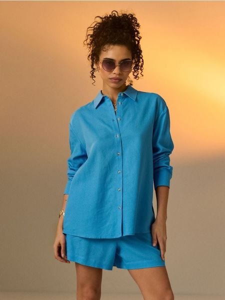 Koszula oversize z domieszką lnu - niebieski. Niebieskie koszule Sinsay, l, bez wzorów, bez kołnierzyka, bez ramiączek. Za 39.99 zł.