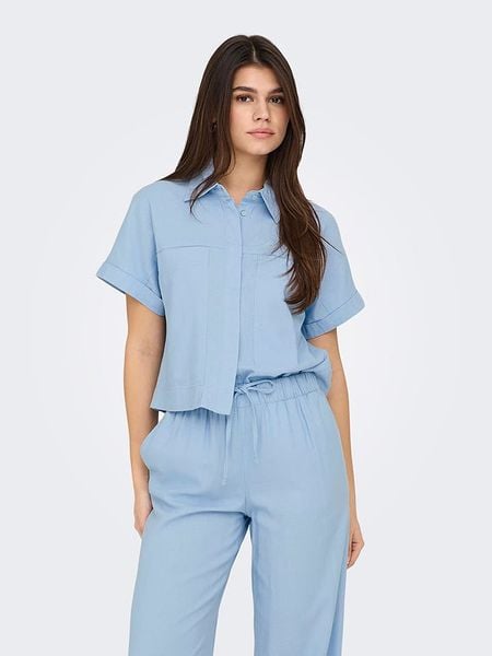 ONLY Bluzka w kolorze błękitnym rozmiar: M. Niebieskie bluzki Only, m, bez wzorów, bez kołnierzyka, bez ramiączek. Za 52.42 zł.