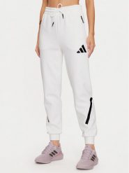 Adidas Spodnie dresowe Z.N.E. JE7843 Biały Regular Fit. Białe spodnie dresowe Adidas, xl, bez wzorów, z bawełny. Za 279.99 zł.