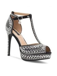 Nine West Sandały NISA SY015-1NW Czarny. Czarne sandały Nine West, bez wzorów, z materiału, bez obcasa, na szpilce, bez zapięcia. Za 299.99 zł.