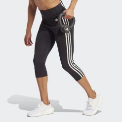 Damskie legginsy z wysoką talią adidas Designed To Move 3-Bandes 3/4 Sport. Białe legginsy Adidas, xs, bez wzorów. Za 190.00 zł.