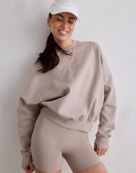 Damska bluza biegowa oddychająca, odprowadzająca wilgoć Le Run ciemna glina. Brązowe bluzy AIM'N, m, bez wzorów, z bawełny, bez kaptura. Za 381.00 zł.