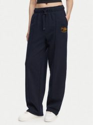 Tommy Hilfiger Spodnie dresowe Logo Exaggerated Seam WW0WW50783 Granatowy Relaxed Fit. Niebieskie spodnie dresowe TOMMY HILFIGER, s, bez wzorów, z bawełny. Za 649.99 zł.