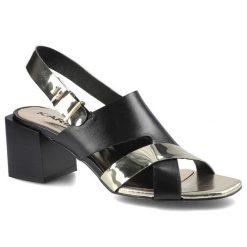 Czarne Sandały Karino Damskie Modne Buty Damskie. Czarne sandały Karino, z aplikacjami, ze skóry, wizytowe, bez obcasa, na obcasie, bez zapięcia. Za 219.00 zł.