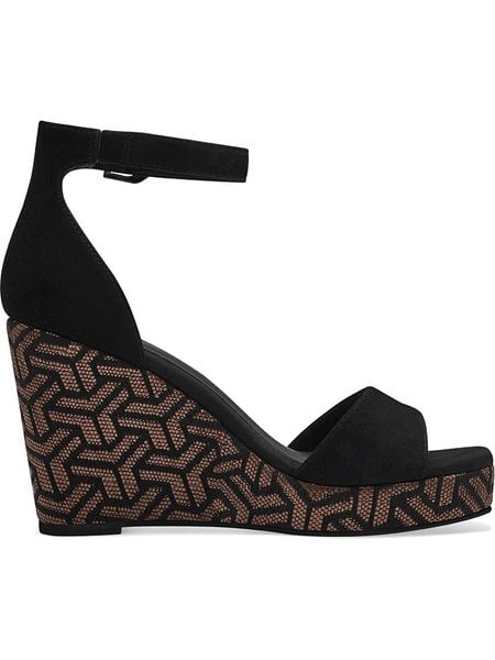 Tamaris Skórzane sandały w kolorze czarnym na koturnie rozmiar: 36. Czarne sandały Tamaris, bez wzorów, z otwartym noskiem, bez obcasa, na koturnie, bez zapięcia. Za 130.81 zł.