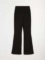 Sportowe legginsy flare Active - czarny. Czarne legginsy Sinsay, l, bez wzorów. Za 49.99 zł.