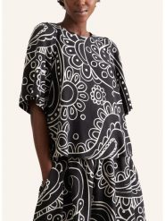 Seidensticker Lniana bluzka w kolorze biało-czarnym rozmiar: 40. Białe bluzki Seidensticker, bez wzorów, ze lnu, bez kołnierzyka, bez ramiączek. Za 225.05 zł.