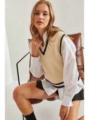 Bianco Lucci Bezrękawnik w kolorze czarno-beżowym rozmiar: onesize. Brązowe swetry Bianco Lucci, bez wzorów, ze splotem, bez ramiączek. Za 82.83 zł.