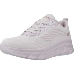Kapcie SKECHERS 117385S Fioletowy. Fioletowe obuwie domowe Skechers, bez wzorów, bez zapięcia. Za 281.99 zł.
