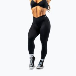 Legginsy treningowe damskie NEBBIA Strong Beauty. Czarne legginsy Nebbia, l, bez wzorów, z elastanu. Za 409.99 zł.