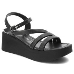 Czarne Sandały Marco Tozzi Wygodne Skórzane Buty. Czarne sandały Marco Tozzi, bez wzorów, ze skóry, bez obcasa, na koturnie, bez zapięcia. Za 269.00 zł.