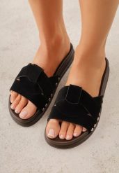 Czarne Klapki z Przekładanymi Paskami i Ozdobnymi Nitami Talysha. Czarne klapki Renee, bez wzorów, z koronki, bez obcasa, na płaskiej podeszwie. Za 79.99 zł.