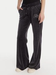 Guess Spodnie dresowe W6RB32 KCUF1 Granatowy Regular Fit. Niebieskie spodnie dresowe Guess, xs, z aplikacjami, z bawełny. Za 389.99 zł.