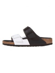Birkenstock Klapki "Arizona Split" w kolorze biało-czarnym rozmiar: 39. Białe klapki Birkenstock, bez wzorów, z otwartym noskiem, bez obcasa. Za 344.54 zł.