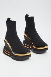 Botki damskie na koturnie BALMAIN. Botki Balmain, bez wzorów, bez obcasa, na koturnie, bez zapięcia. W wyprzedaży za 4,716.75 zł.
