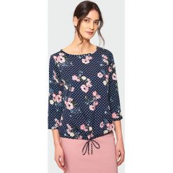 Elegancka bluzka z troczkiem. Bluzki marki Greenpoint. Za 39.99 zł.