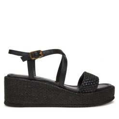 Sandały Unisa. Czarne sandały Unisa, bez wzorów, bez obcasa, na koturnie, bez zapięcia. Za 419.99 zł.