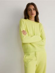 Bluza regular z bawełną - jasnozielony. Zielone bluzy Reserved, l, bez wzorów, z bawełny, bez kaptura. W wyprzedaży za 59.99 zł.