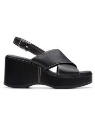 Clarks Skórzane sandały "Manon Wish" w kolorze czarnym na koturnie rozmiar: 41,5. Czarne sandały Clarks, bez wzorów, z otwartym noskiem, bez obcasa, na koturnie, bez zapięcia. Za 230.00 zł.