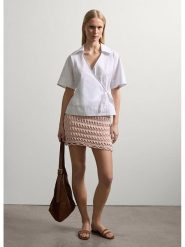 STEFANEL Bluzka w kolorze białym rozmiar: S. Białe bluzki Stefanel, s, bez wzorów, z bawełny, bez kołnierzyka, bez ramiączek. Za 130.99 zł.