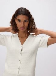 Kardigan ze strukturalnym splotem - kremowy. Białe kardigany Reserved, l, bez wzorów, z dzianiny. Za 99.99 zł.