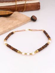 Charlize Pozłacany naszyjnik z tygrysim okiem i perłami - dł. 50 cm rozmiar: onesize. Białe naszyjniki Charlize, z perłą, pozłacane. Za 134.85 zł.