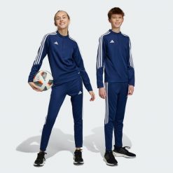 Tiro 23 Club Training Pants. Białe spodnie dresowe Adidas, bez wzorów, z dresówki. Za 110.99 zł.