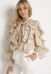 Beżowa Koszula z Wiskozą o Luźnym Kroju z Falbanami i Wiązaniem Ravionel. Brązowe koszule Born2be, m, bez wzorów, z wiskozy, eleganckie, bez kołnierzyka, bez ramiączek. Za 169.99 zł.