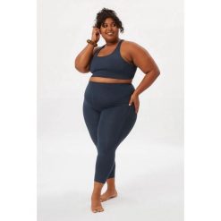 Damskie legginsy Girlfriend Collective Compressive High-Rise. Niebieskie legginsy GIRLFRIEND COLLECTIVE, bez wzorów. Za 389.50 zł.