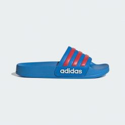 Klapki Adilette Shower. Białe klapki Adidas, bez wzorów, bez obcasa. Za 109.00 zł.
