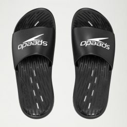 Klapki basenowe antypoślizgowe damskie Speedo Slides. Czarne klapki Speedo, bez wzorów, z materiału, bez obcasa. Za 139.99 zł.