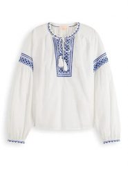 Scotch & Soda Bluzka w kolorze biało-niebieskim rozmiar: 34. Białe bluzki Scotch & Soda, bez wzorów, z bawełny, bez kołnierzyka, bez ramiączek. Za 118.84 zł.