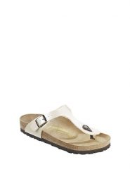 Birkenstock Japonki w kolorze kremowym rozmiar: 40. Brązowe klapki Birkenstock, bez wzorów, z materiału, z otwartym noskiem, bez obcasa. Za 265.45 zł.