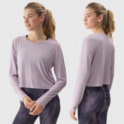LONGSLEEVE DAMSKI 4F CROP-TOP DO JOG BLUZA Z DODATKIEM MODALU KOLOR FIOLETOWY. Fioletowe bluzy 4f, l, bez wzorów, z materiału, bez kaptura. Za 79.99 zł.