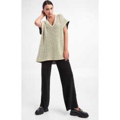 Tunika WOLFORD. Swetry Wolford, s, bez wzorów, bez ramiączek. W wyprzedaży za 1,164.87 zł.