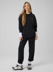 4F Spodnie z szerokimi nogawkami z modalem damskie - czarne XS. Czarne spodnie dresowe 4f, xs, bez wzorów, z dresówki. Za 189.99 zł.