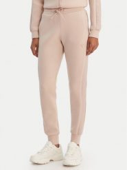 Guess Spodnie dresowe V2YB18 K7UW2 Beżowy Regular Fit. Brązowe spodnie dresowe Guess, xl, z aplikacjami, z dresówki. Za 369.99 zł.