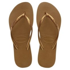 Klapki damskie Havaianas Slim. Brązowe klapki Havaianas, bez wzorów, z materiału, bez obcasa. Za 138.00 zł.