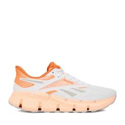 Buty do biegania Reebok. Białe obuwie sportowe Reebok, bez zapięcia, do biegania. Za 369.99 zł.