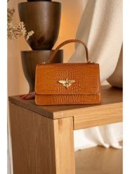 Christian Laurier Skórzana torebka "Lily" w kolorze karmelowym - 19 x 11 x 7,5 cm rozmiar: onesize. Brązowe torebki klasyczne Christian Laurier, bez wzorów, z materiału, bez dodatków. Za 239.99 zł.