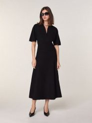 Rodier Wełniana sukienka w kolorze czarnym rozmiar: L. Czarne sukienki Rodier, l, bez wzorów, z wełny, bez kołnierzyka, bez ramiączek, midi. Za 499.19 zł.