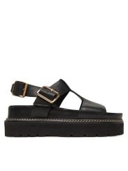 Clarks Sandały Orianna Sky 26181263 Czarny. Czarne sandały Clarks, bez wzorów, ze skóry, bez obcasa, na koturnie, bez zapięcia. Za 539.99 zł.