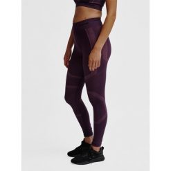 Legginsy damskie Hummel hmlMT. Czerwone legginsy Hummel, bez wzorów. Za 177.00 zł.