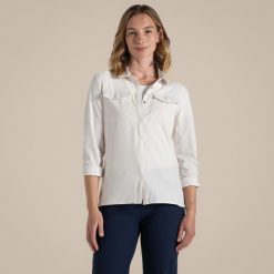 Koszula trekkingowa damska Craghoppers NosiLife Pro Long Sleeved Shirt III. Białe koszule Craghoppers, bez wzorów, casualowe, bez kołnierzyka, bez ramiączek. Za 389.99 zł.